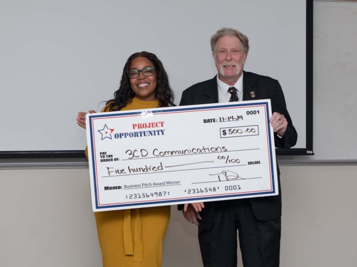 Tracie R. Dean Pitch Award Check Presentation